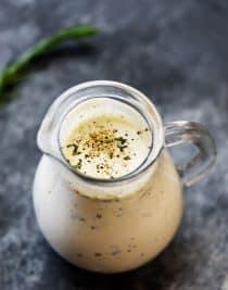 Rosemary Ranch Dressing Recipe - This simple ranch dressing is an update to the classic ranch dressing with fresh rosemary and spices and adds so much flavor to salads, chicken, and so many dishes! // addapinch.com