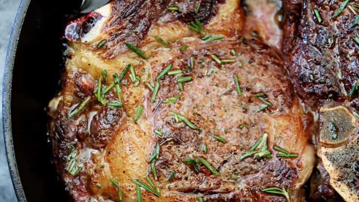 Skillet Rib Eye Steaks Recipe - Butter-basted skillet rib eye steaks that will remind you of your favorite steak house rib eye steaks! // addapinch.com