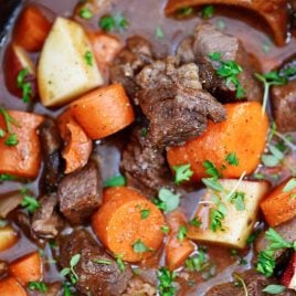 Slow Cooker Beef Bourguignon Recipe - A classic beef bourguignon recipe made easy in the slow cooker! Loaded with vegetables, beef, and a thick, rich sauce perfect for entertaining or busy weeknights! // addapinch.com