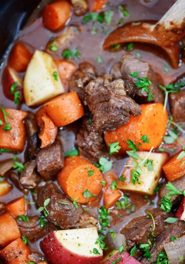 Slow Cooker Beef Bourguignon Recipe - A classic beef bourguignon recipe made easy in the slow cooker! Loaded with vegetables, beef, and a thick, rich sauce perfect for entertaining or busy weeknights! // addapinch.com
