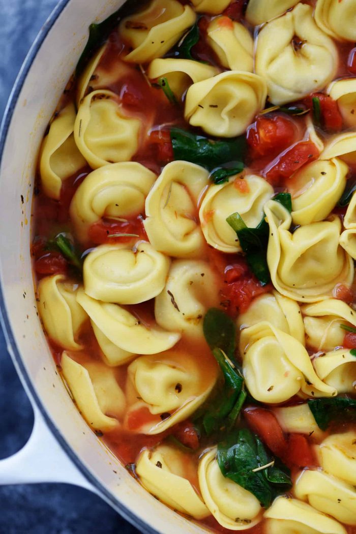 Vegetable Tortellini Soup Recipe - This quick and easy vegetable tortellini soup comes together in minutes for a flavorful soup recipe loaded with vegetables and delicious bites of tortellini. // addapinch.com