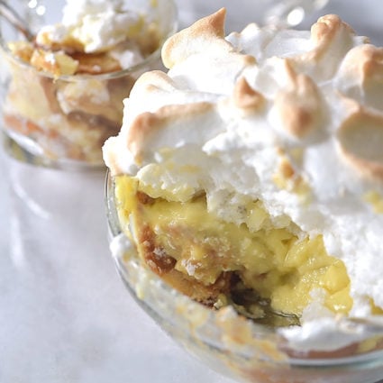 Southern Banana Pudding Recipe - An heirloom family recipe for banana pudding that is a classic, Southern dessert. Creamy, traditional banana pudding topped with airy meringue. // addapinch.com