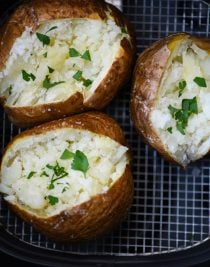 Air Fryer Baked Potato Recipe - This quick and easy air fryer baked potato recipe makes a perfect baked potato every time! Tender on the inside and crispy on the outside! // addapinch.com