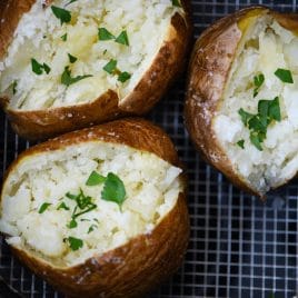 Air Fryer Baked Potato Recipe - This quick and easy air fryer baked potato recipe makes a perfect baked potato every time! Tender on the inside and crispy on the outside! // addapinch.com