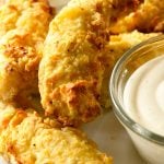 Air Fryer Chicken Tenders Recipe - These crispy, tender and delicious chicken fingers are baked to perfection in the air fryer. // addapinch.com