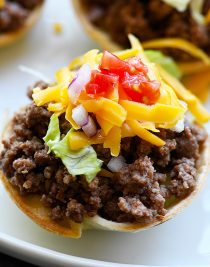 Taco Cups Recipe - This Taco Cups Recipe comes together in 15 minutes for a fast, fun, and fabulous dish! Made with just five ingredients, plus optional toppings, it is sure to be a weeknight staple! // addapinch.com