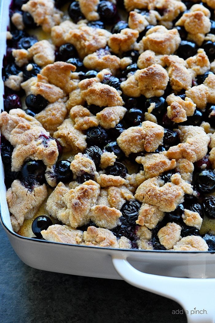 Blueberry Coffee Cake Recipe with Crumb Topping - Made with fresh blueberries and a delicious crumb topping, this blueberry coffee cake is always a favorite! Perfect for breakfast, brunch, or dessert! // addapinch.com