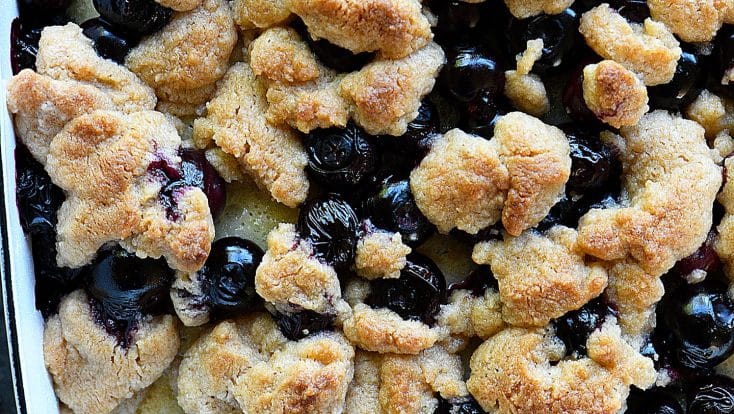 Blueberry Coffee Cake Recipe with Crumb Topping - Made with fresh blueberries and a delicious crumb topping, this blueberry coffee cake is always a favorite! Perfect for breakfast, brunch, or dessert! // addapinch.com