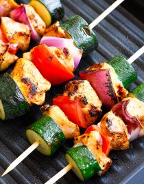Chili Rubbed Chicken Skewers Recipe - Ready in minutes, these chicken skewers are a weekend AND a weeknight favorite! The secret is the chili rubbed chicken! // addapinch.com