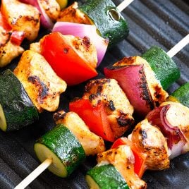 Chili Rubbed Chicken Skewers Recipe - Ready in minutes, these chicken skewers are a weekend AND a weeknight favorite! The secret is the chili rubbed chicken! // addapinch.com