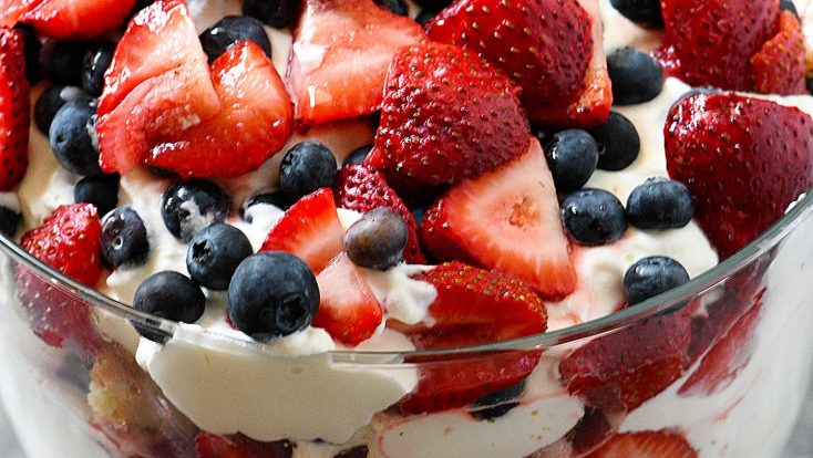 Blueberry Strawberry Trifle Recipe - This classic trifle recipe is layered with vanilla cake, whipped cream, vanilla pudding and fresh blueberries and strawberries for a delicious, crowd-favorite dessert. // addapinch.com
