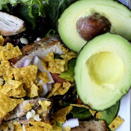 Grilled Chicken Fiesta Salad Recipe - This simple grilled chicken salad recipe is kicked up a notch for a spicy Tex-Mex favorite! // addapinch.com