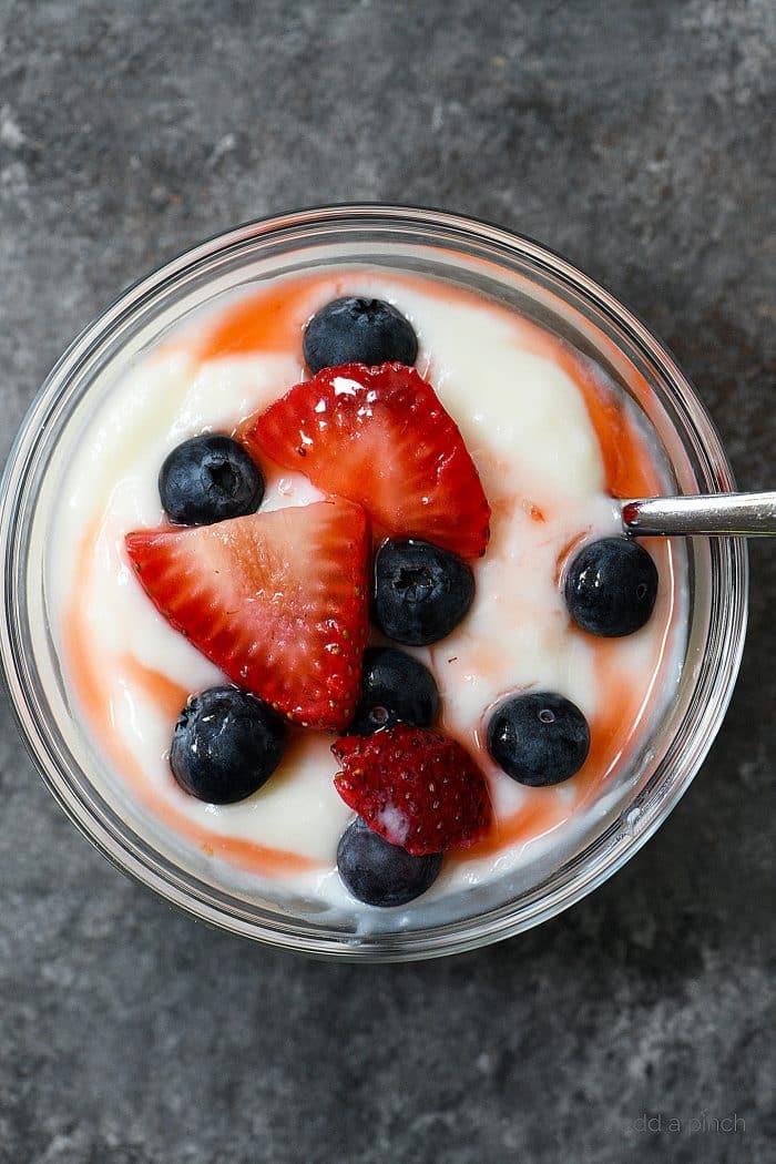 Homemade Vanilla Pudding Recipe - Super easy, this creamy, classic vanilla pudding is fabulous on its own or with fruits, cookies, and so much more! Egg-free and ready in minutes! // addapinch.com