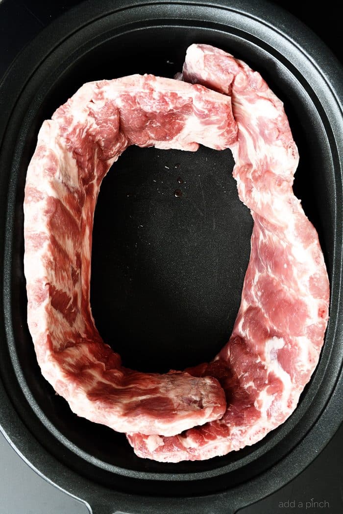 Slow cooker insert with racks of ribs // addapinch.com