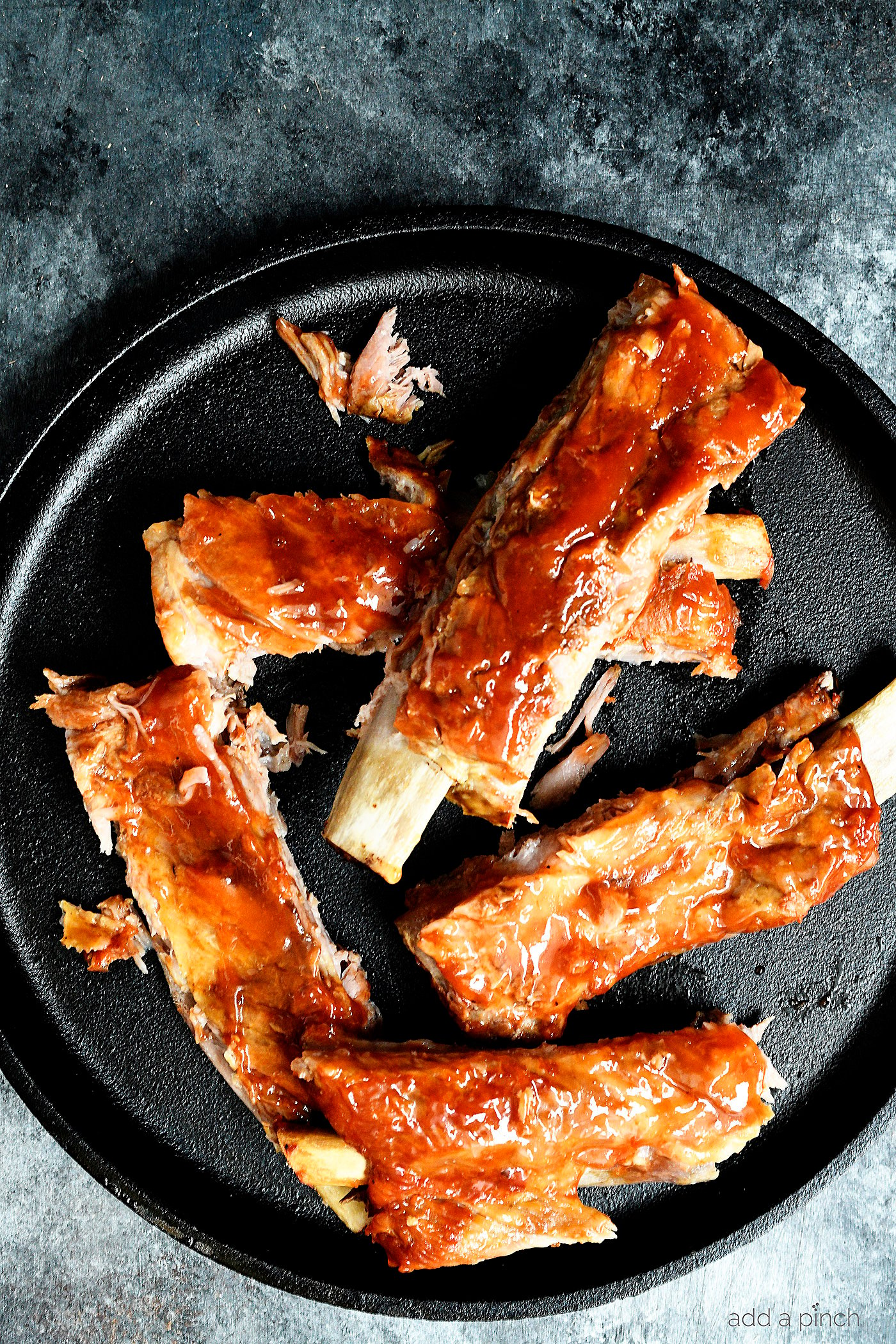 Easy Slow Cooker Ribs Recipe - Add a Pinch