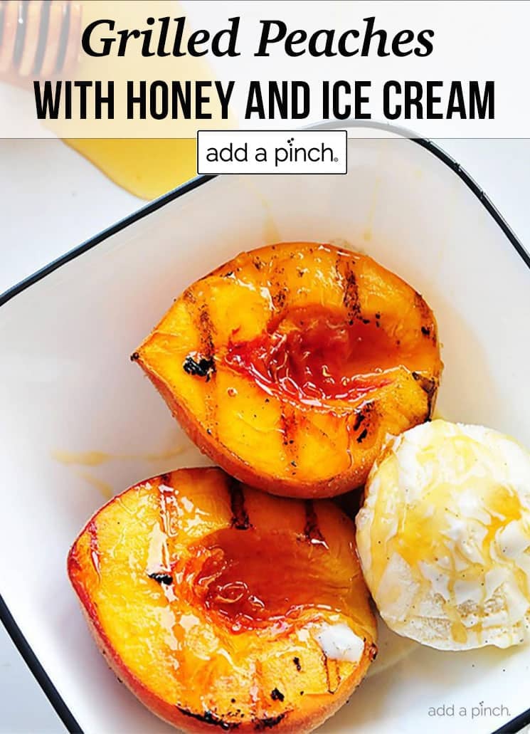 Grilled peaches in bowl with ice cream, drizzled with honey - with text - addapinch.com
