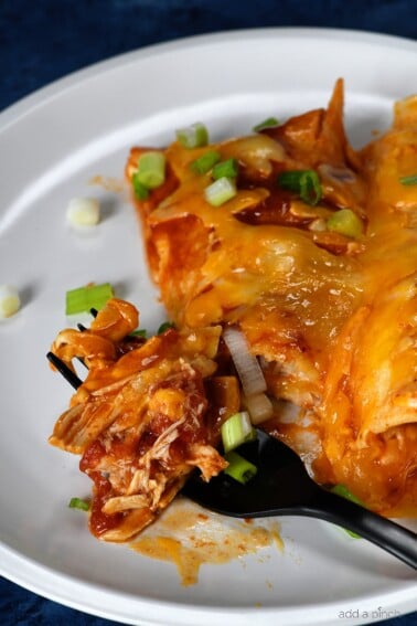 Buffalo Chicken Enchiladas Recipe - These quick and easy buffalo chicken enchiladas are so simple, yet scrumptious! Ready and on the table in 30 minutes!