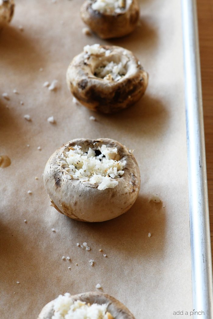 French Onion Soup Stuffed Mushrooms Recipe - My favorite French Onion Soup meets stuffed mushrooms in this delicious appetizer recipe!  // addapinch.com