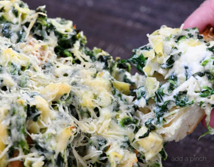 Spinach Artichoke Pull Apart Bread Recipe - Everyone's favorite spinach artichoke served in a whole new way in this fun and easy pull apart bread! // addapinch.com