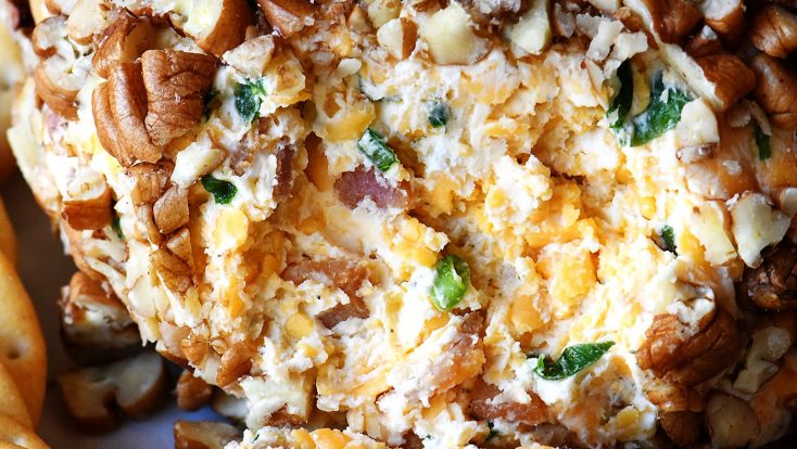 Bacon Ranch Cheese Ball Recipe - This creamy, dreamy cheese ball melds together bacon, ranch seasoning, and is the encased in chopped pecans. Perfect for easy entertaining! // addapinch.com