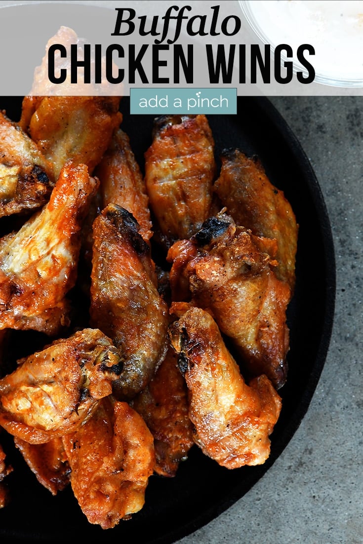 Crispy Buffalo Chicken Wings on plate - with text - addapinch.coming