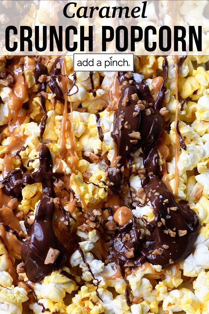 Closeup of caramel, chocolate and toffee bits atop popcorn - with text - addapinch.com