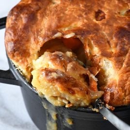 Chicken Pot Pie with Puff Pastry Recipe - A classic chicken pot pie recipe topped with flaky puff pastry and with wholesome, comforting, homemade ingredients. // addapinch.com