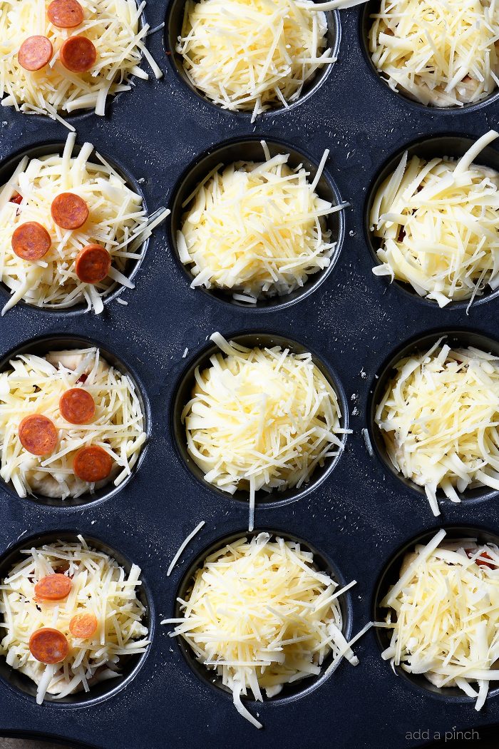 Deep Dish Pizza Cups Recipe - These deep dish pizza cups make a fun and delicious way to serve everyone's favorite pizza! // addapinch.com