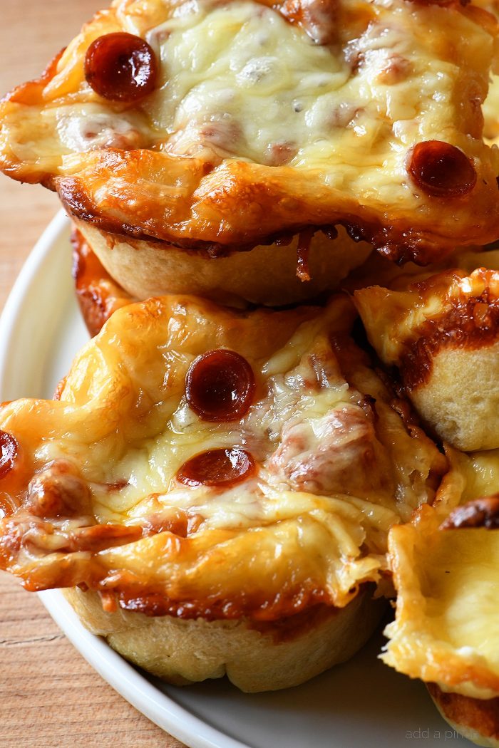 Deep Dish Pizza Cups Recipe - These deep dish pizza cups make a fun and delicious way to serve everyone's favorite pizza! // addapinch.com
