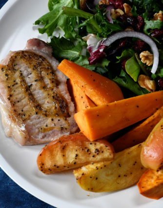 Sheet Pan Pork Chops with Sweet Potatoes and Apples Recipe - This easy one pan meal comes together in a snap! Pork chops, sweet potatoes and apples all basted in a balsamic dijon sauce and baked to perfection! // addapinch.com