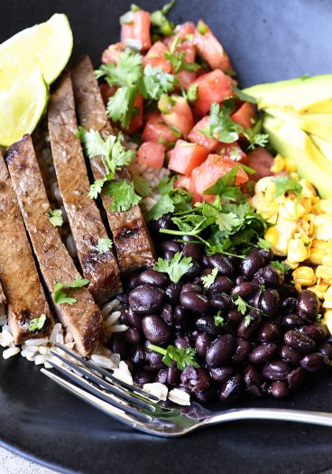 Steak Burrito Bowl Recipe - This easy steak burrito bowl recipe is one that rivals the restaurant version! Ready and on the table in minutes! // addapinch.com