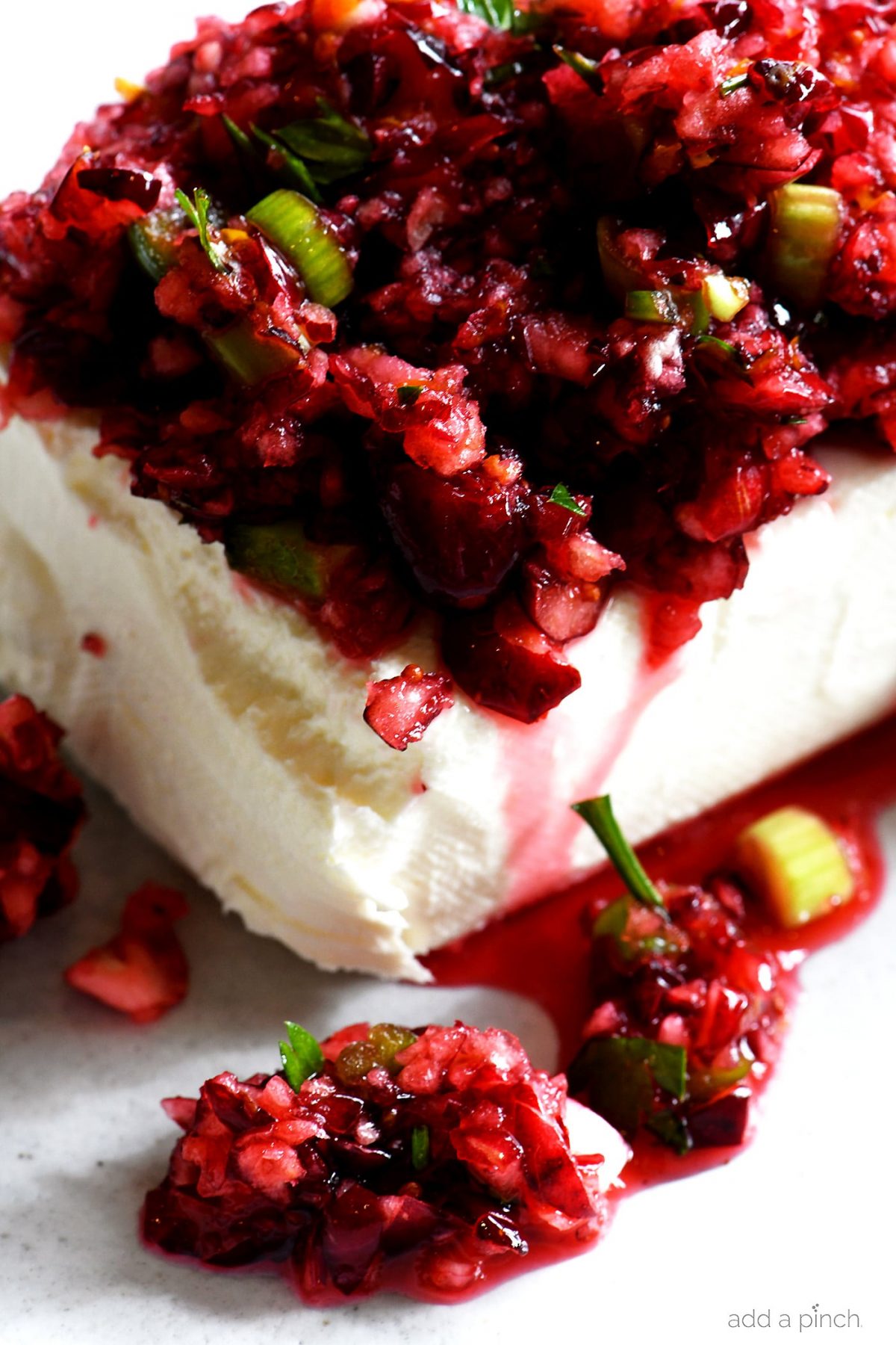 Cranberry Salsa over Cream Cheese Spread on platter // addapinch.com