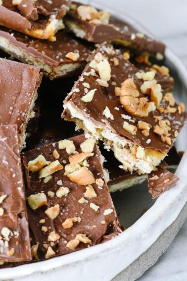 Saltine Cracker Toffee Candy Recipe - Cracker toffee or Christmas crack is a favorite, easy recipe made with only five ingredients! // addapinch.com