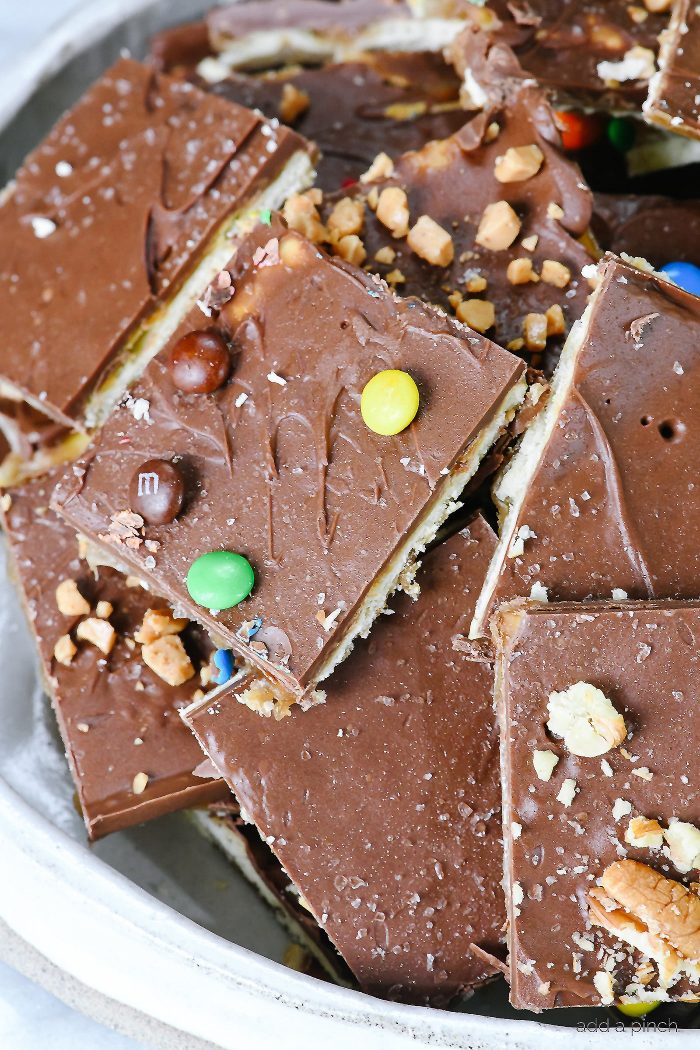 Saltine Cracker Toffee Candy Recipe - Cracker toffee or Christmas crack is a favorite, easy recipe made with only five ingredients! // addapinch.com