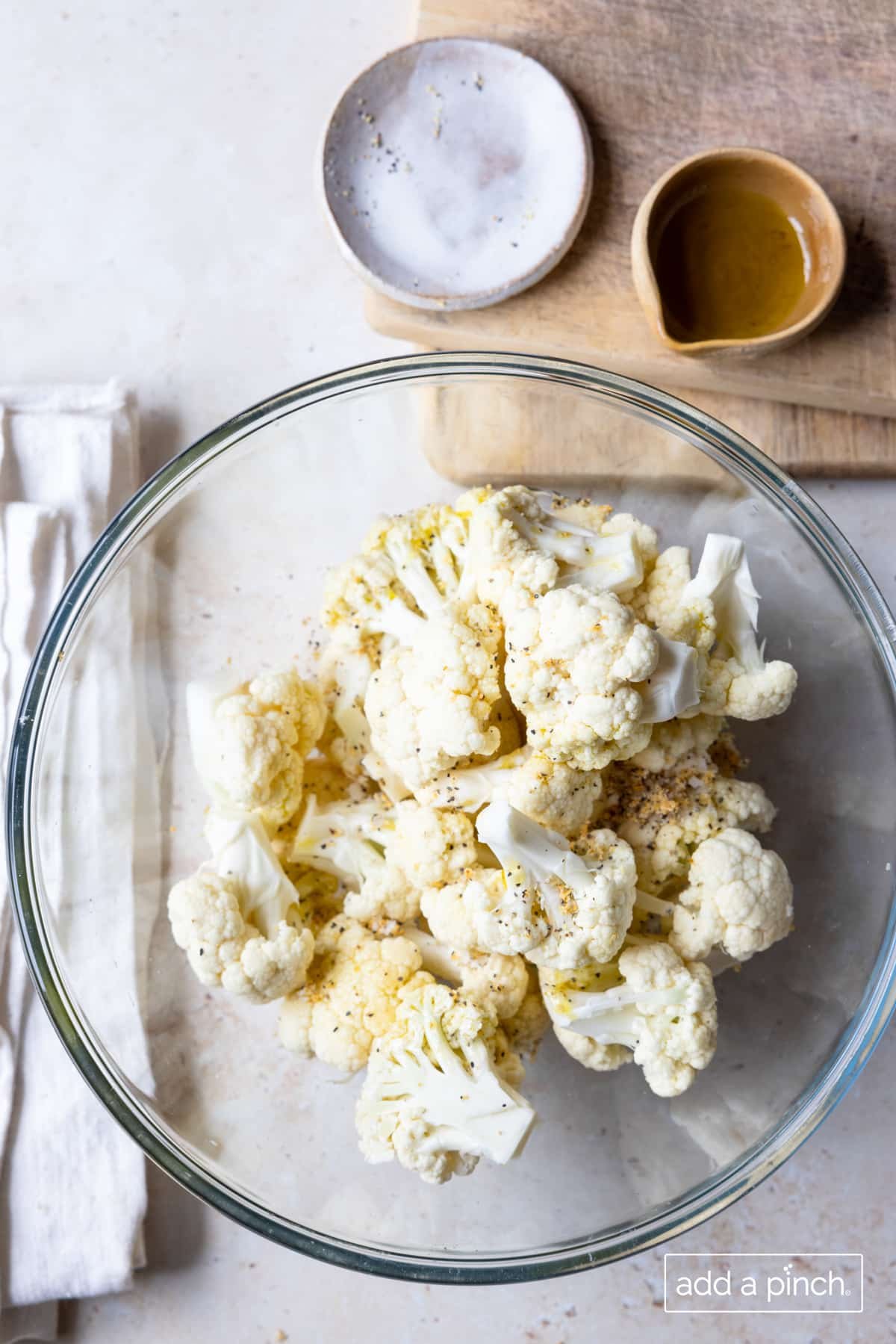Photo of cauliflower florets in a glass bowl.