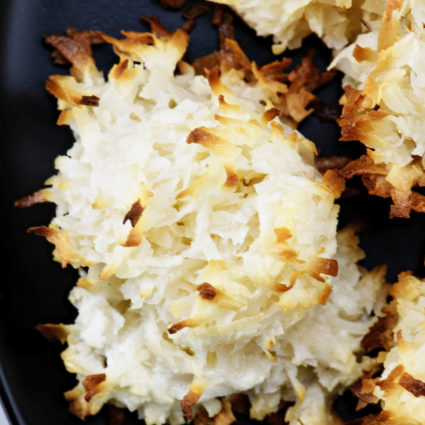 Easy Coconut Macaroons Recipe - These easy coconut macaroons are made with just five ingredients. Golden brown, they are light, chewy and filled with flavorful coconut! // addapinch.com