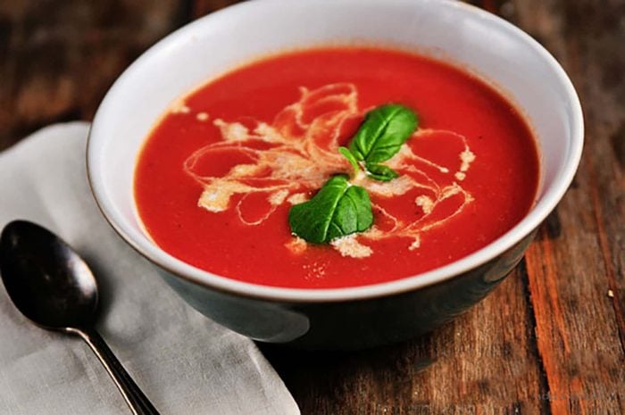 Tomato Soup Recipe - This fresh, homemade tomato soup comes together quickly for a delicious, comforting classic. Ready in 15 minutes!  // addapinch.com