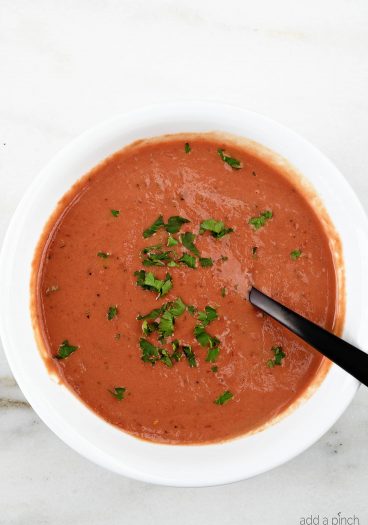 Tomato Soup Recipe - This fresh, homemade tomato soup comes together quickly for a delicious, comforting classic. Ready in 15 minutes!  // addapinch.com