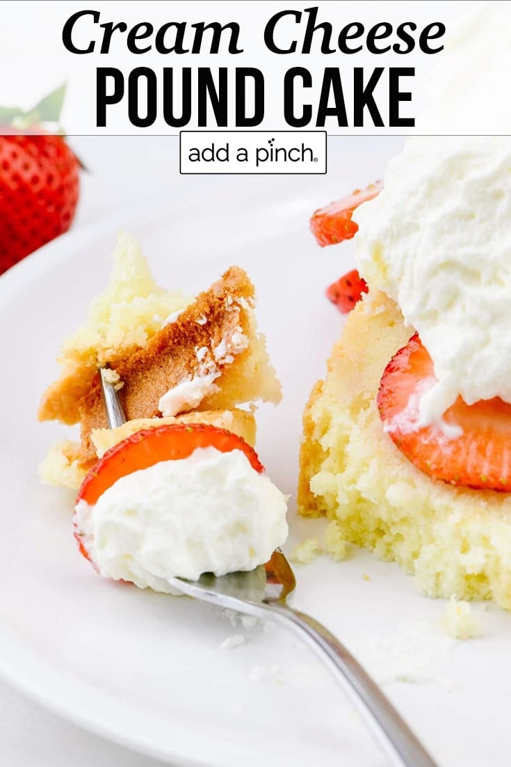 Slice of Cream Cheese Pound Cake with Whipped Cream and sliced strawberries - with text - addapinch.com