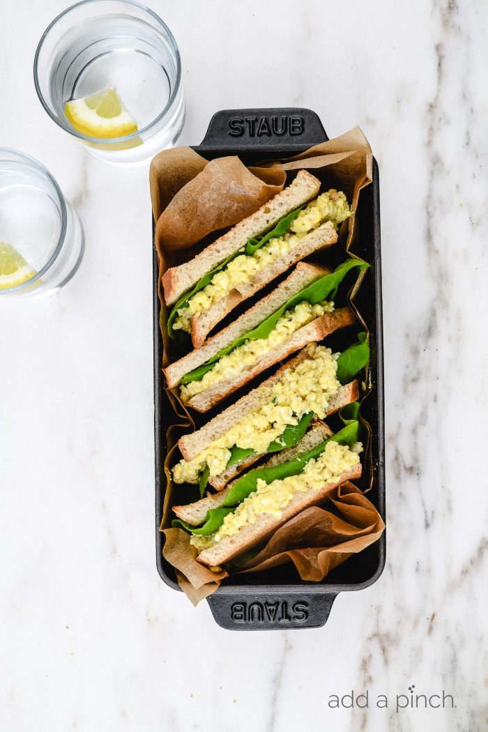 Egg Salad Sandwich Recipe - This classicÂ egg salad sandwich recipe makes the best sandwich recipe! Light, creamy and delicious it makes the perfect quick and easy lunch or light supper. Â // addapinch.com