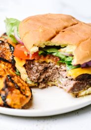 Just 2 ingredients is all you need to take the usual burger recipe the next level for the BEST beef hamburgers I've ever tasted!  // addapinch.com
