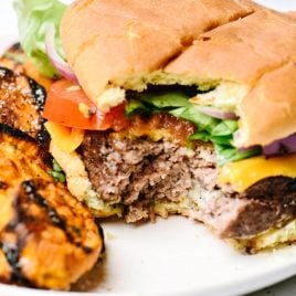 Just 2 ingredients is all you need to take the usual burger recipe the next level for the BEST beef hamburgers I've ever tasted!  // addapinch.com