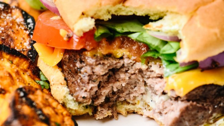 Just 2 ingredients is all you need to take the usual burger recipe the next level for the BEST beef hamburgers I've ever tasted!  // addapinch.com