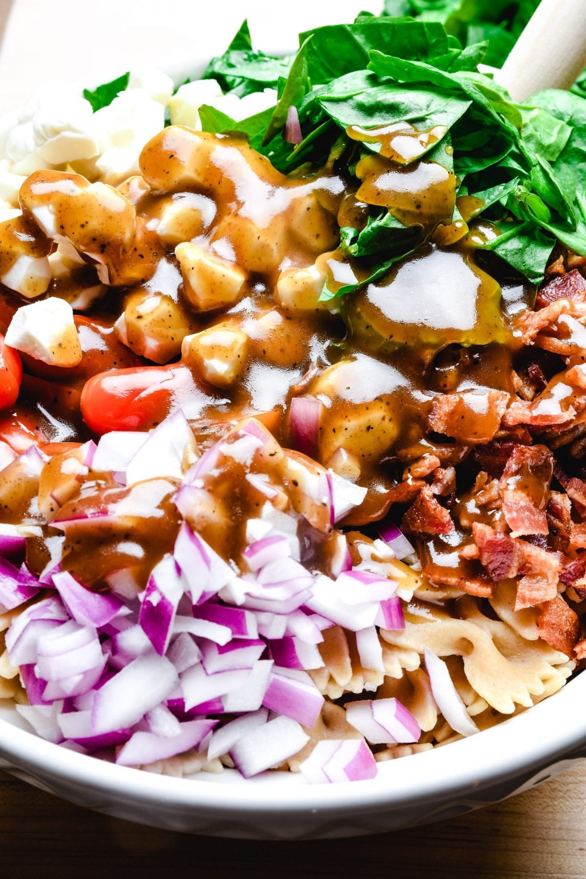 Dressing ready to mix into pasta salad ingredients.