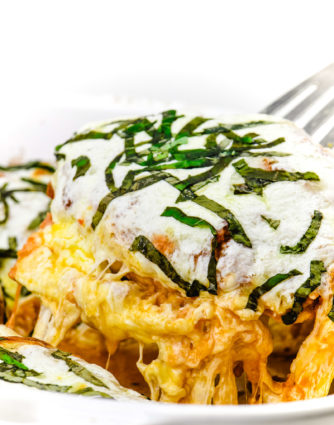 Chicken Parmesan Recipe - Crispy chicken is topped with marinara sauce, Parmesan and mozzarella cheeses for an easy, classic Italian favorite. Ready in 30 minutes! // addapinch.com