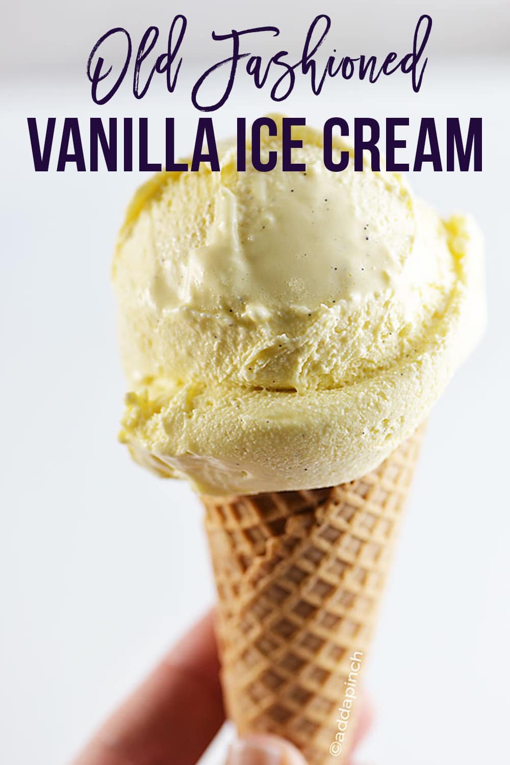 Scoop of Old Fashioned Vanilla Ice Cream in a Cone - with text - addapinch.com