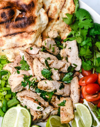Easy Cilantro Lime Grilled Chicken recipe is quick to make for a meal that is juicy and full of flavor. // addapinch.com