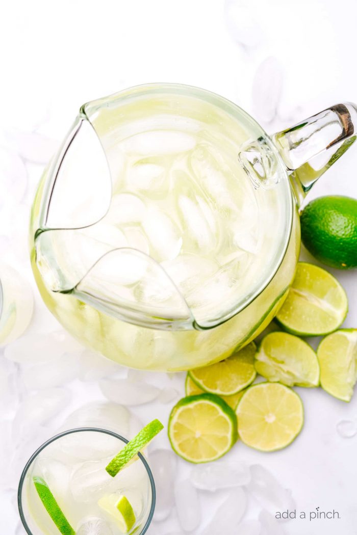 Limeade makes a refreshing drink, especially in the summer. Made of limes, sugar, and water, this limeade recipe is a keeper! // addapinch.com