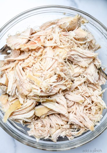 This Easy Shredded Chicken recipe makes meal prep even easier! Made with just two ingredients, you can customize to use in so many ways!  // addapinch.com