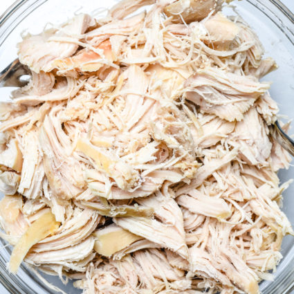 This Easy Shredded Chicken recipe makes meal prep even easier! Made with just two ingredients, you can customize to use in so many ways!  // addapinch.com